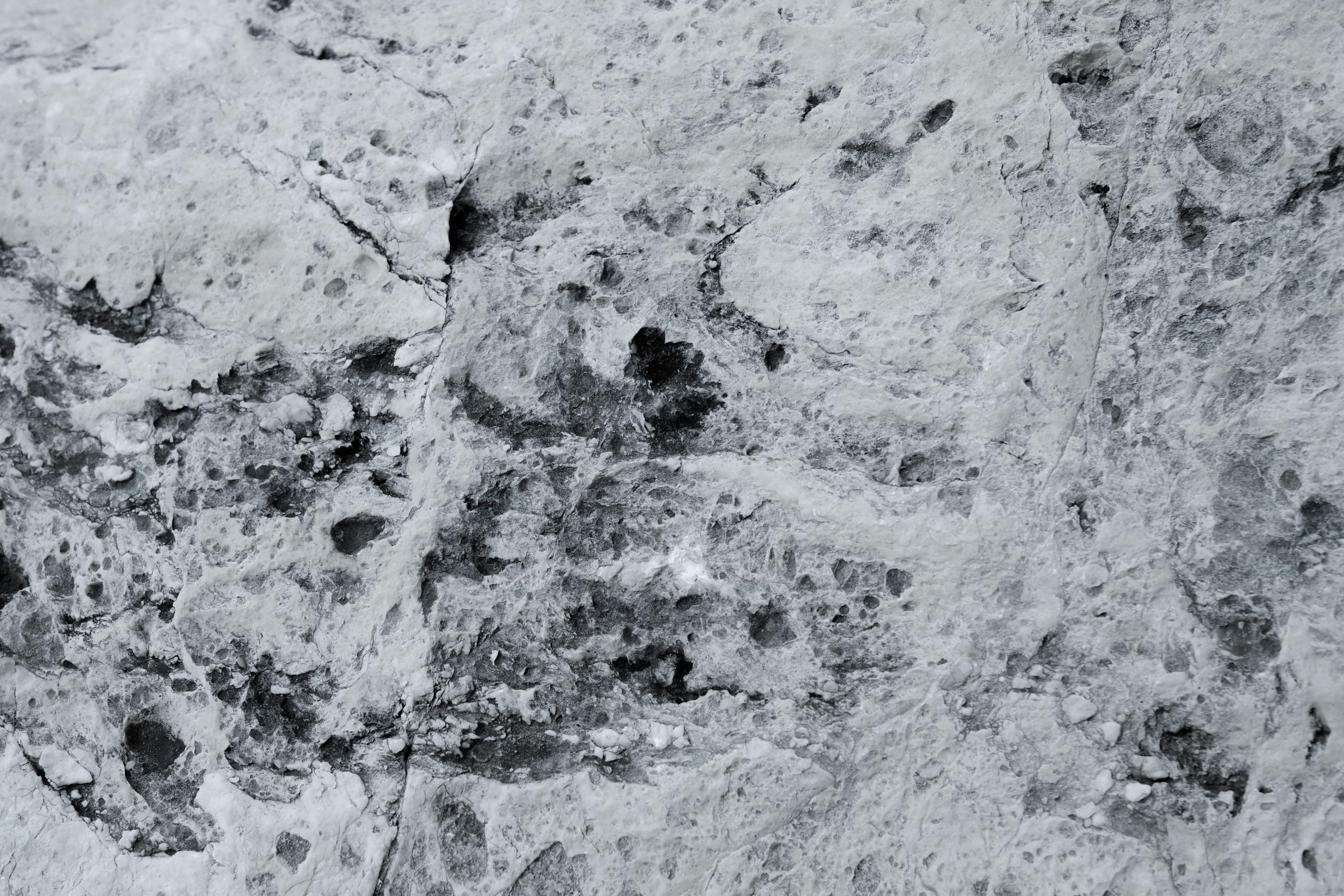 Surface pierre texturee avec motifs intriques